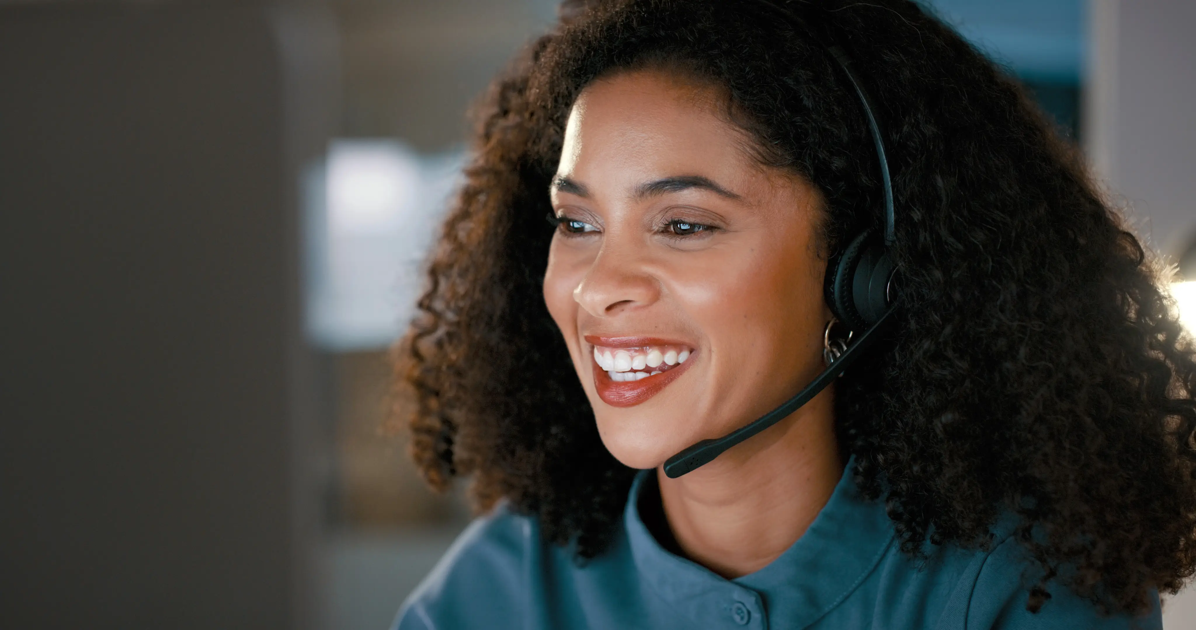 Smiling customer service representative wearing a headset
