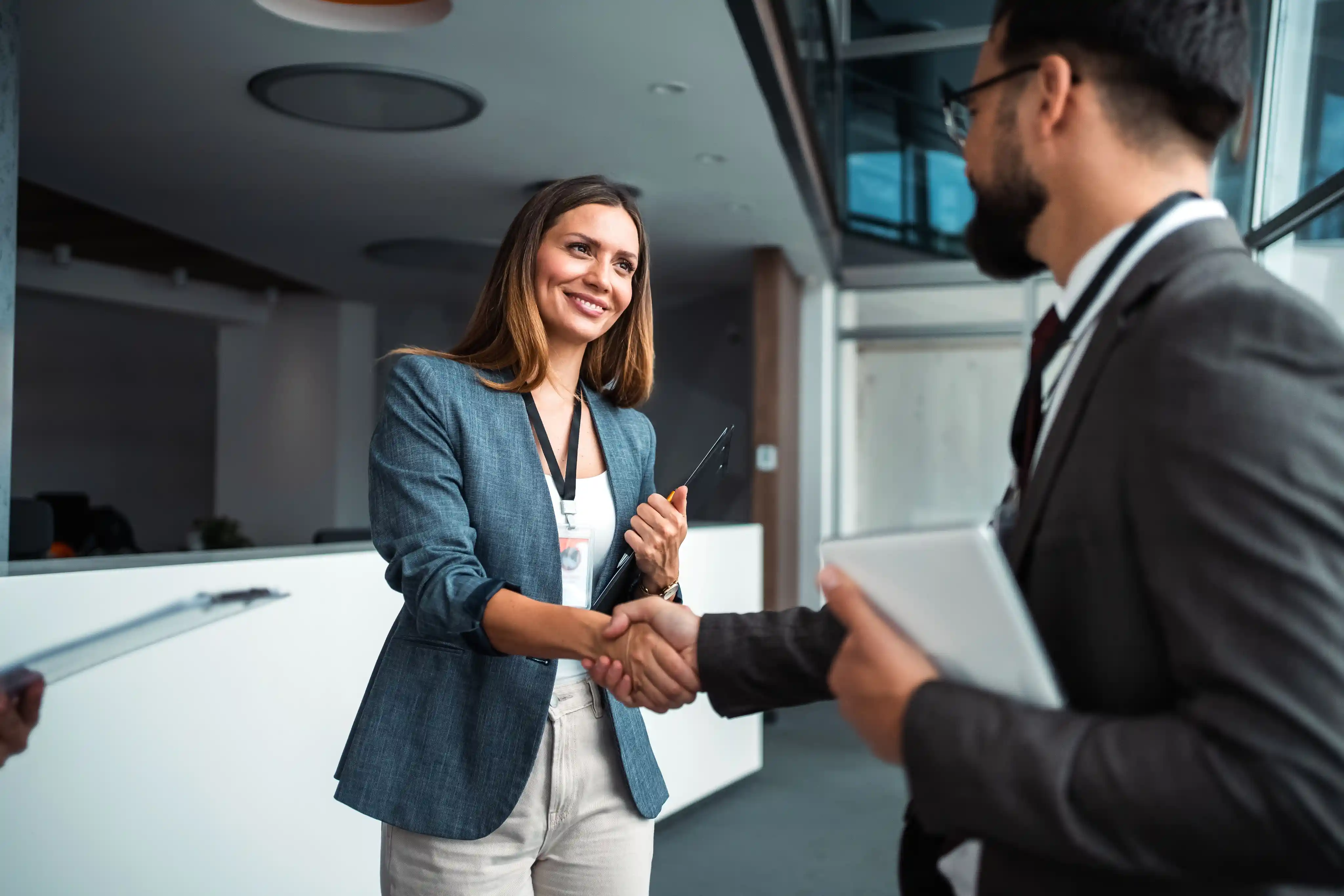 Implementation specialists collaborating with a client team